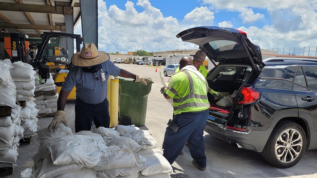 Bradenton residents get sandbags at the Public Works Annex, 1411 Ninth St. W. Forecasts for heavy rain next week are prompting Manatee County to urge residents to prepare.