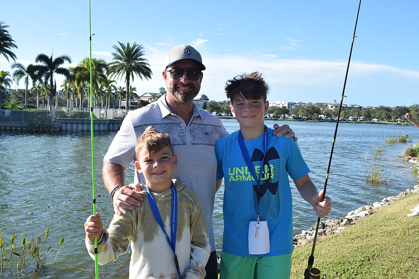 Lakewood Ranch 8-year-old Avery Green, his dad, Steve Green, and 13-year-old brother Ashton Green are new to fishing after moving from New Jersey to the area three months ago. Steve Green says the tournament will become a new family tradition.