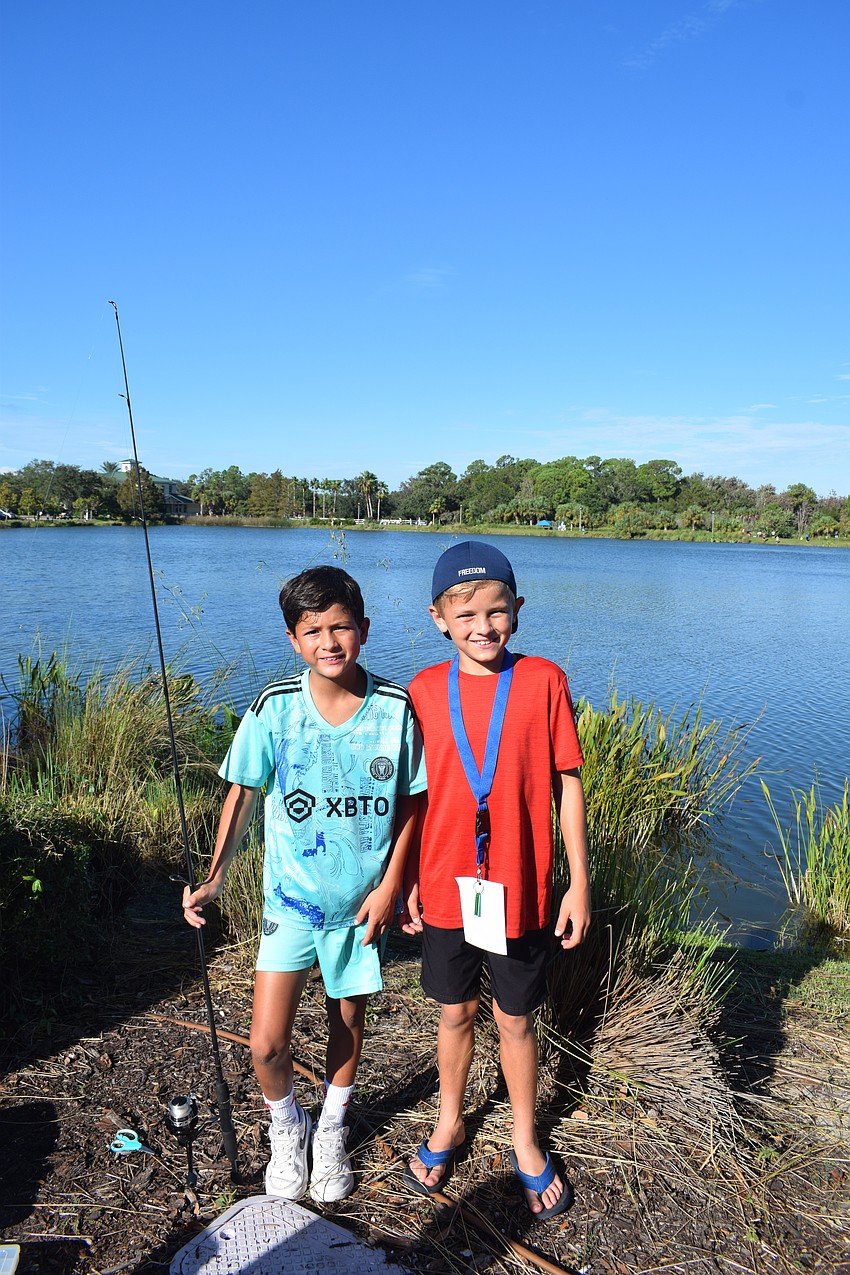 Lakewood Ranch 11-year-old Andrew Baker and 10-year-old Brad Olinger spend time fishing side-by-side during the tournament.