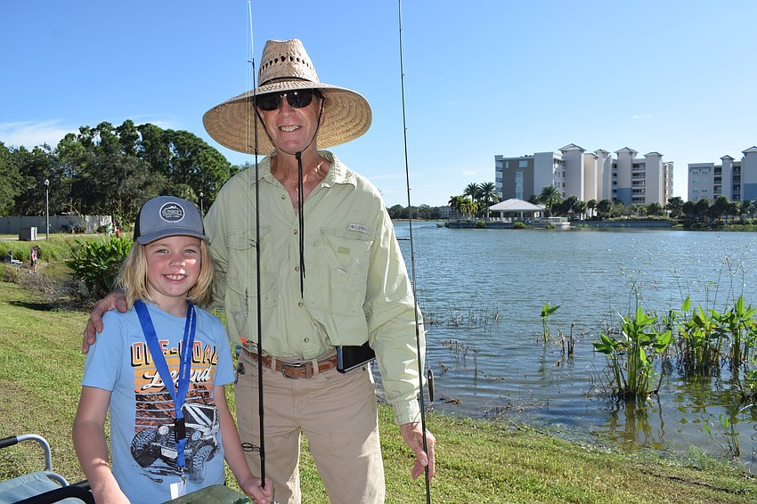 Holden Lake, who is 8, participates in the tournament with the help of his grandfather, Myakka City's Harry Traylor. 