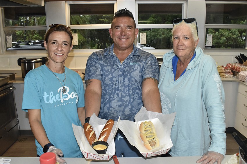 Kitchen staff Vanya Krayhova, Craig Nuncio, and Maureen Gresk prepared some Oktoberfest cuisine.
