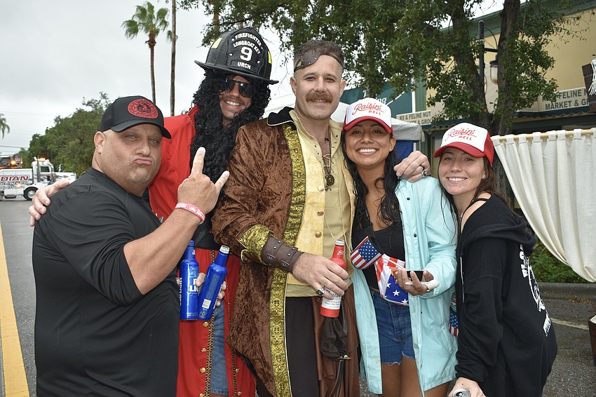 Venice firefighter Donnie Morrell, Longboat Key firefighters Zachary Schield and Jamison Urch and Michelle Lowe and Taylor Hall enjoyed living a pirate's life.