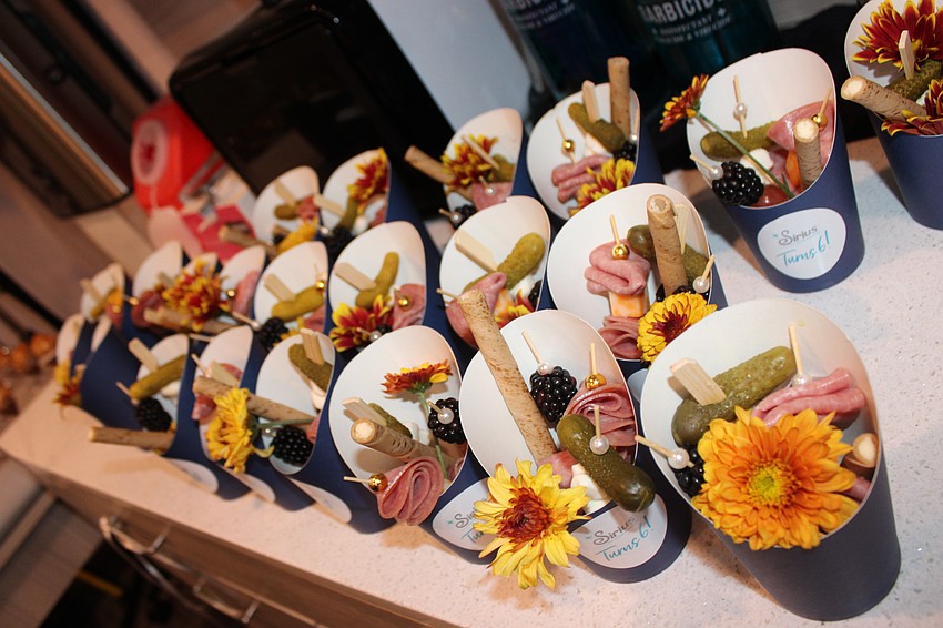 Karen Medford says Pineapple Kitchen, which made snacks for the Sirius Day Spa's sixth anniversary party, has always been a supporter of her business.