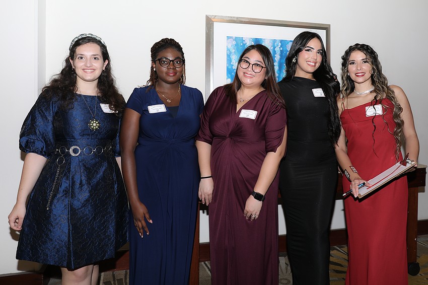 Student volunteers include Ambrozia Itellari, Vanessa Adjei, Jenina Estrada, Joarelys Medina Nieves, and Noralis Betancourt Medero