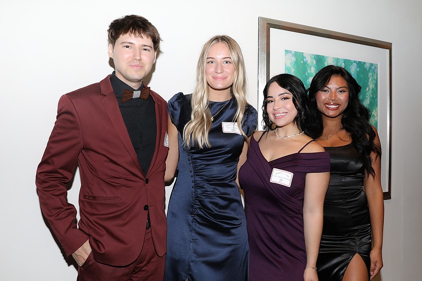 Andrew Smith, Rena Chickos, Lyan Valentin and Angely Lonh are student volunteers.