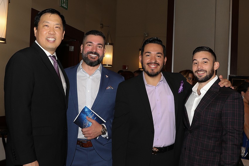Dr. Thomas Yoon, dean of Lecom's Dental School,  with Dr. Mark McCaughey, Dr. Jose Roque and Dr. Nathan Estrin
