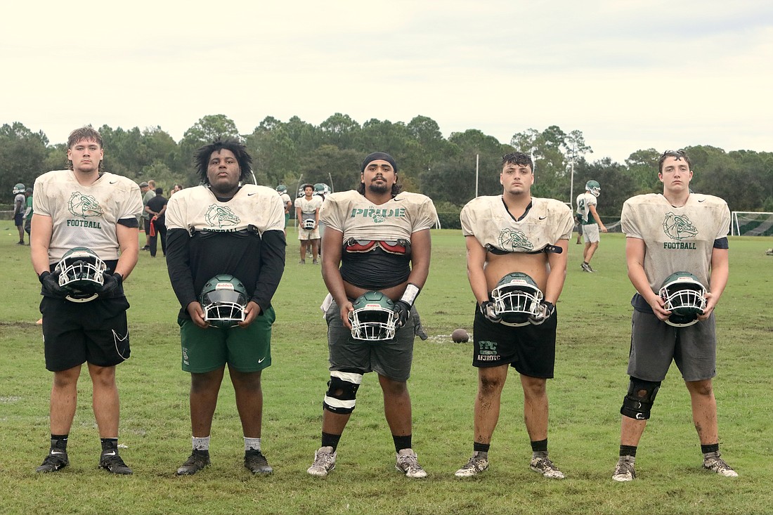 Flagler Palm Coast's offensive line: Right tackle Zachary Farrell, right guard Isaiah Stiggons, center Angel De Leon, left guard Gethin Pritchard and left tackle Gavin Petty. Photo by Brent Woronoff