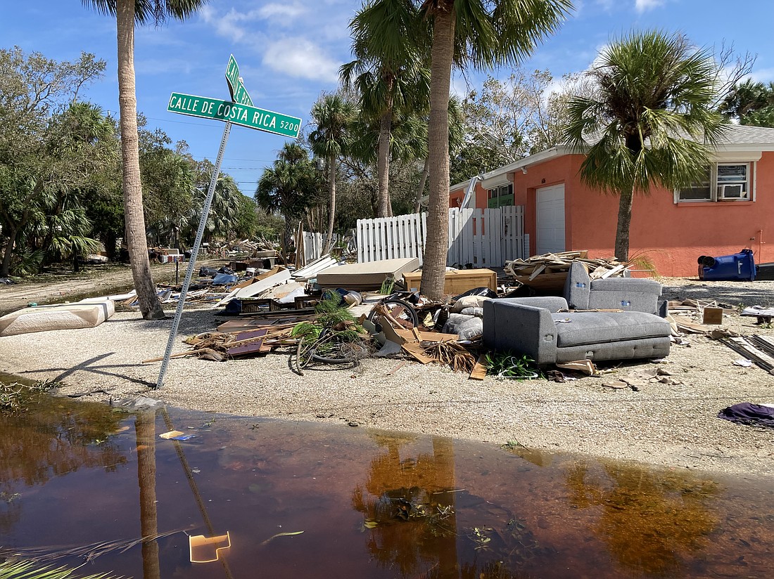 Welcome to Calle de Peru — the standard look along the neighborhood streets east of Siesta Key Village.