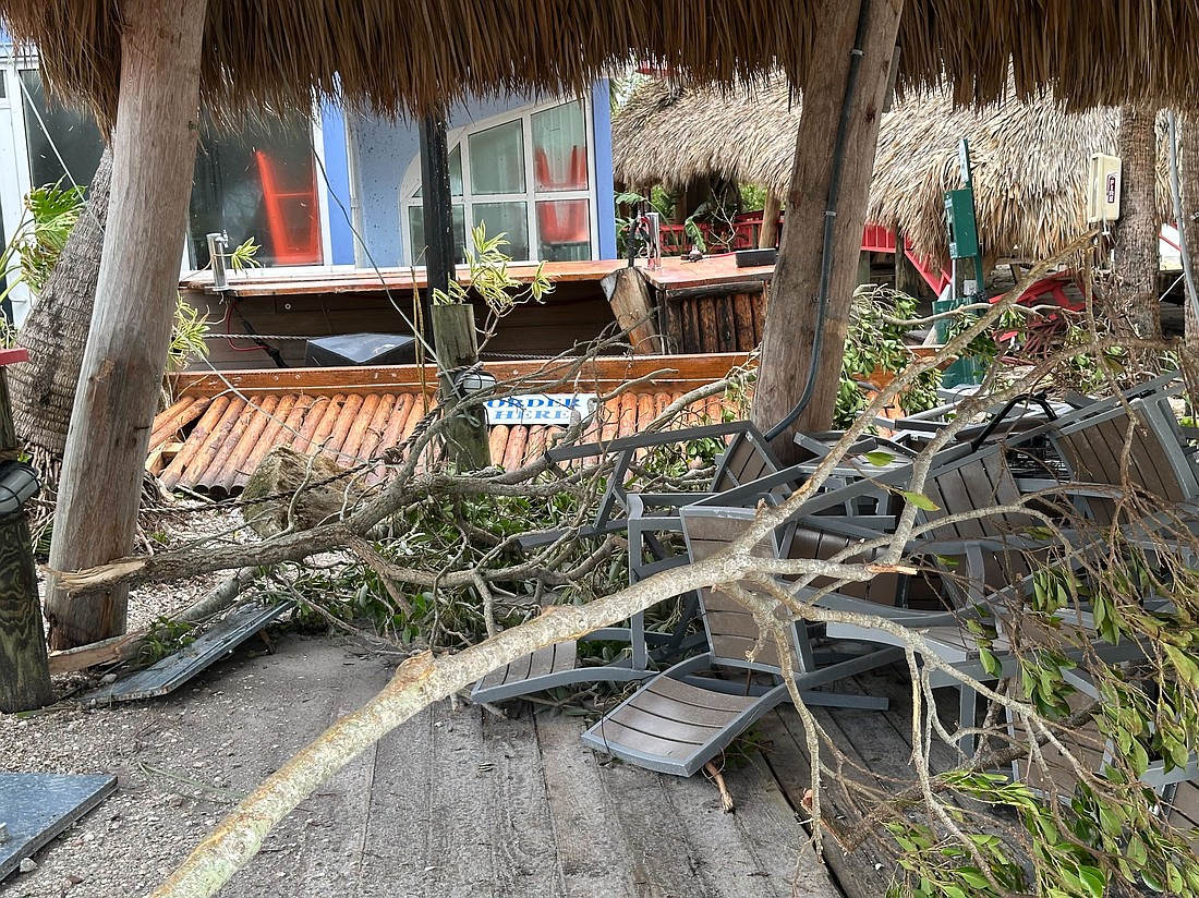 At O'Leary's on Sarasota Bay, the bar was pushed out from under the Tiki hut.