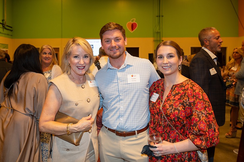 Teri Hansen with Tucker and Lauren Horsley