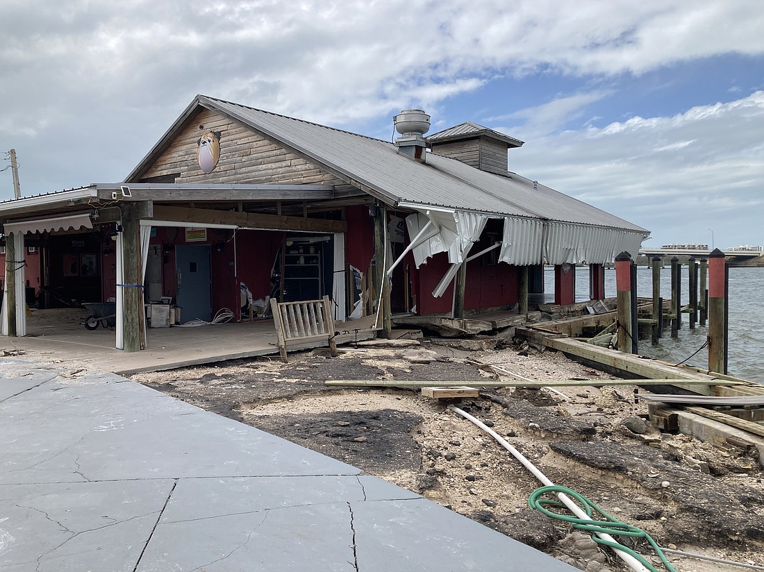 Helene brought four feet of water inside the Old Salty Dog; Milton crashed through it shutters and tore its historic bar in two.