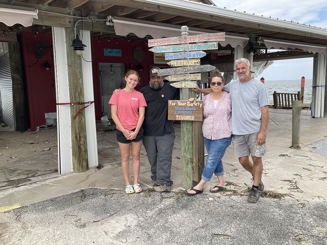 Back for a second time in 10 days to assess the damage to the Old Salty Dog: Daughter Emma Blair, manager Josh Shear, general manager Amy Blair and Bill Blair.