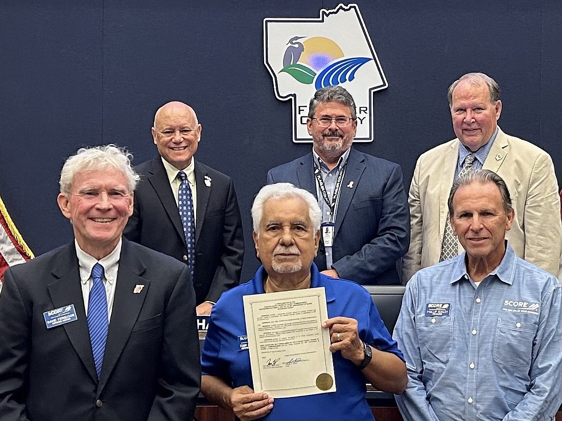 Front row: SCORE certified mentors Dave Ferguson, Tony Flores and Philip Bailey. Back row: Flagler County commissioners Donald O'Brien, Andy Dance and Greg Hansen. Courtesy photo