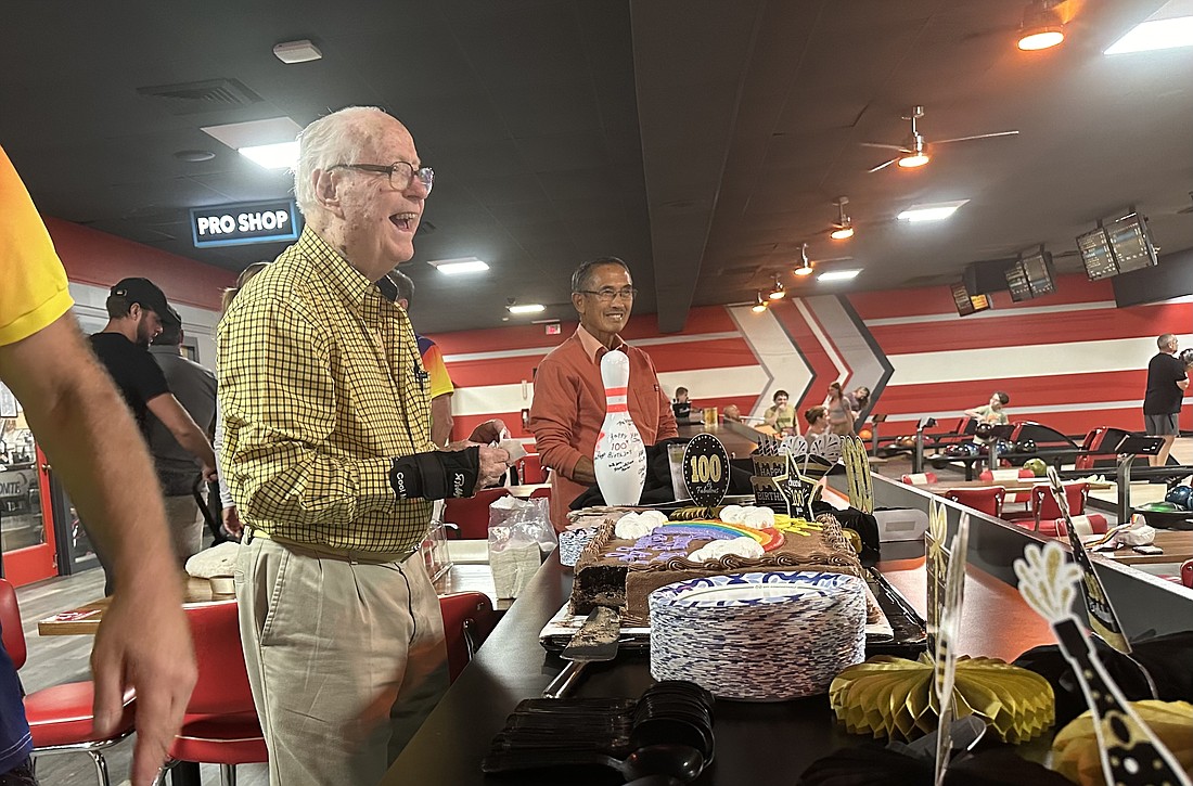 James Simpson laughs during his 100th birthday celebration Oct. 7 at Bowlero Gulf Gate in Sarasota.