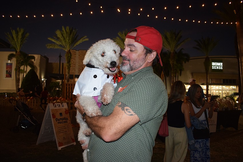 Winnie, a chef, receives some love from Nokomis' Tim Fanning.
