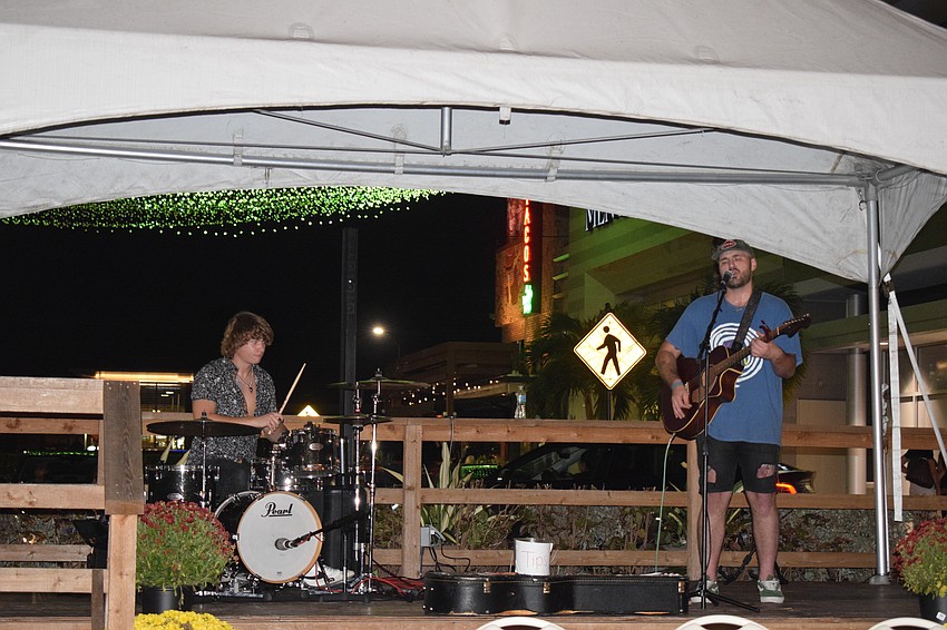 Tampa's Logan Lavo performs with Nate Mosley at Barks and Boos.