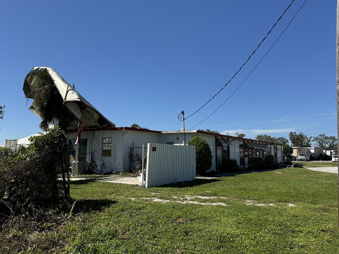 The roof was peeled off a building on Palmer Boulevard in Sarasota County.