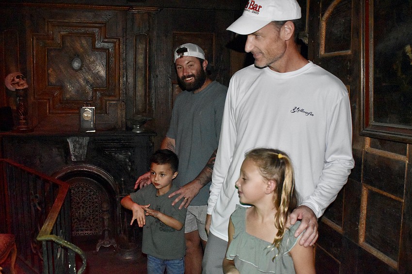 Danny Burton and Eric Burton, 4, and Joe Provolish and Reese Provolish, 7, weren't too scared when they took a tour of the haunted manor.