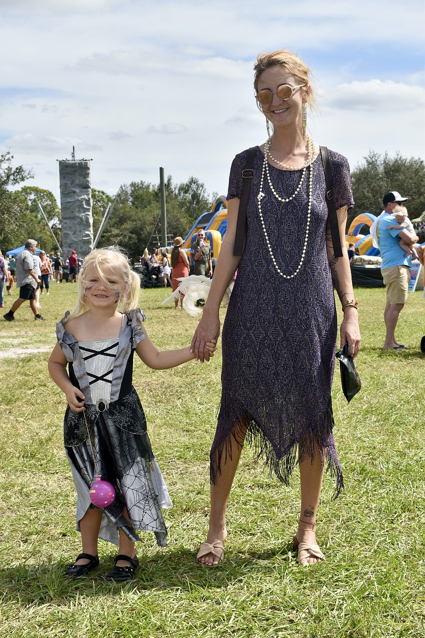 PJ Tumpkin, 4, dressed as a spider princess, and Devin Tumpkin