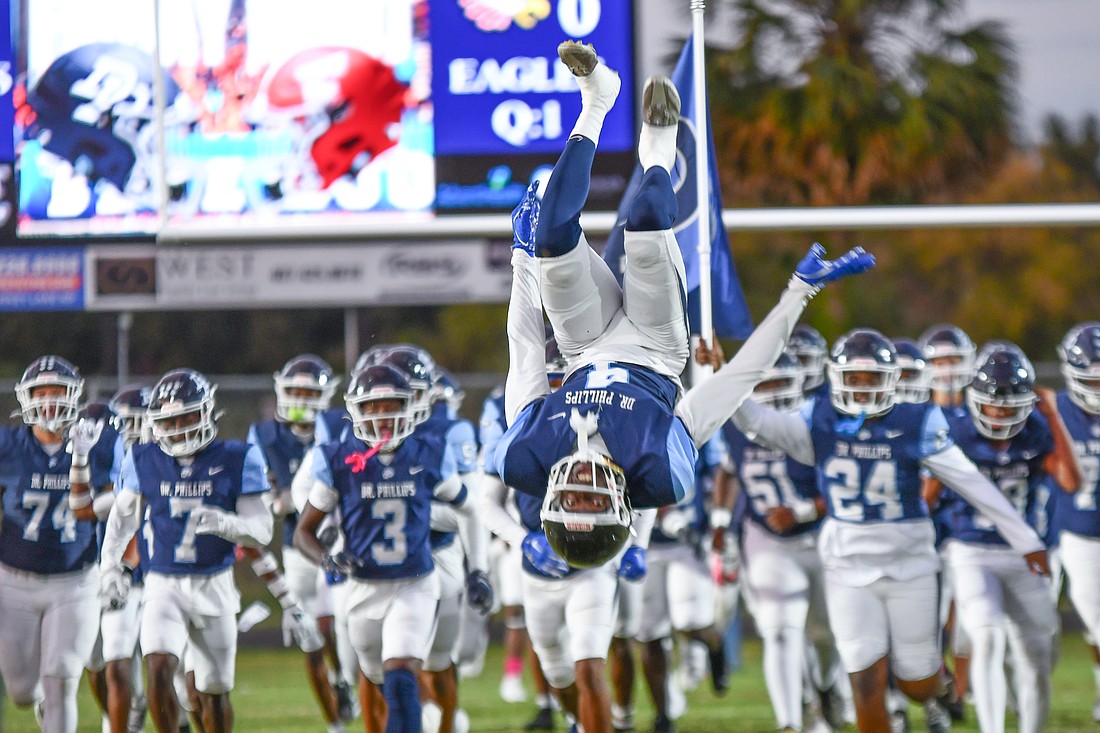 Panthers' wide receiver Mykel Calixte (No. 4) led the team on the field for its Week Nine game with this backflip.