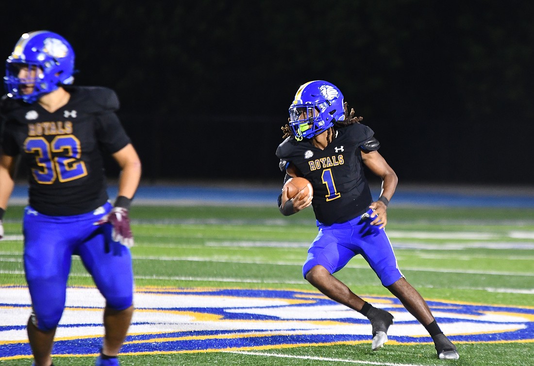 The First Academy quarterback Salomon Georges Jr. (No. 1) has been vital to the Royals 2024 season.