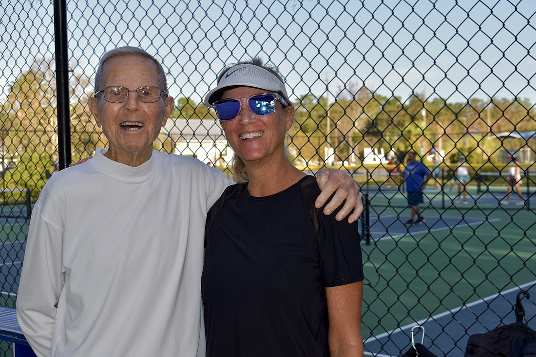 Vince Golden and Kerry Urell play pickleball together at Longwood Park. According to Golden, nobody bakes better banana bread than Urell.