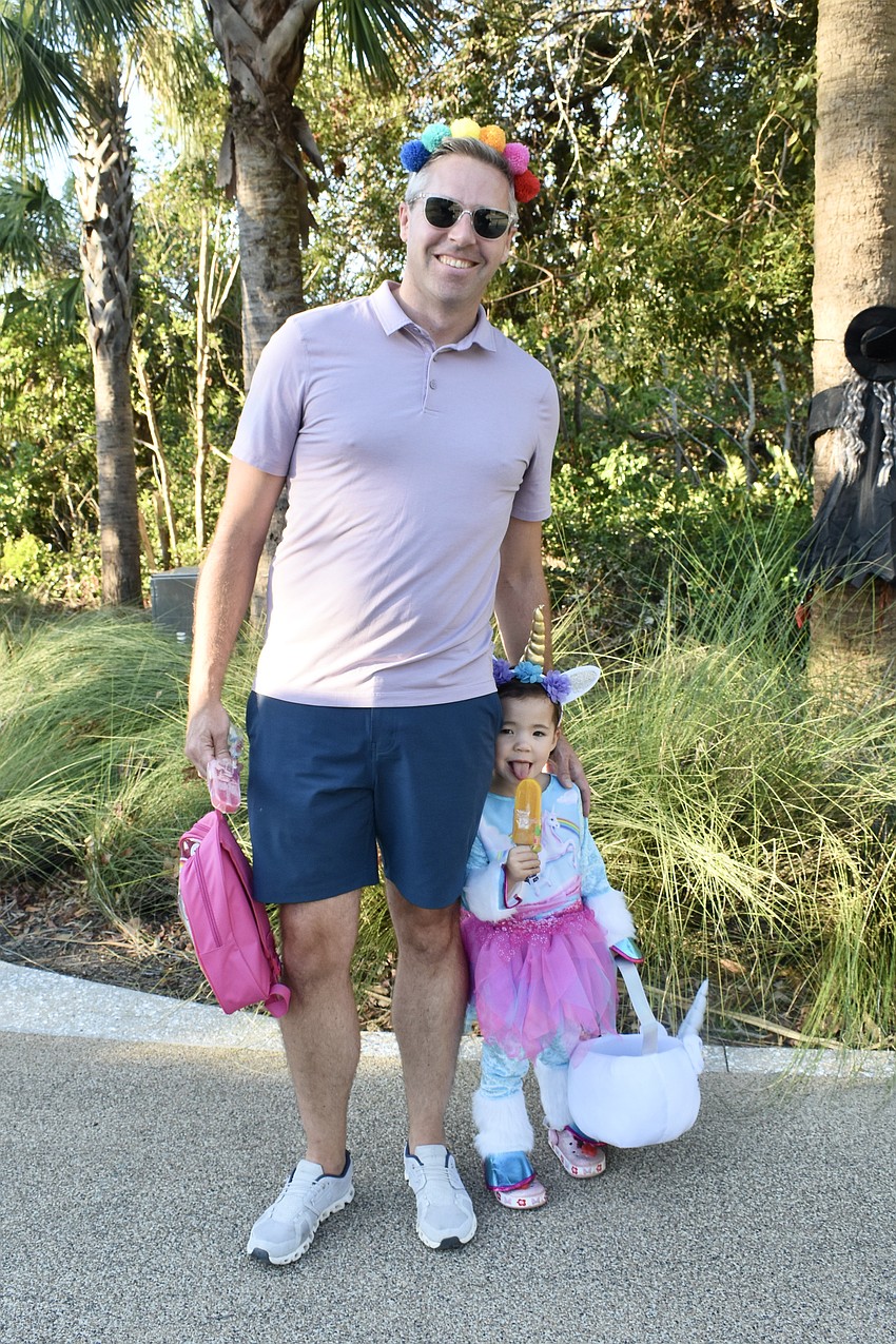 Sean Johnston and Sophie Johnston, 3, came in complimenting costumes.