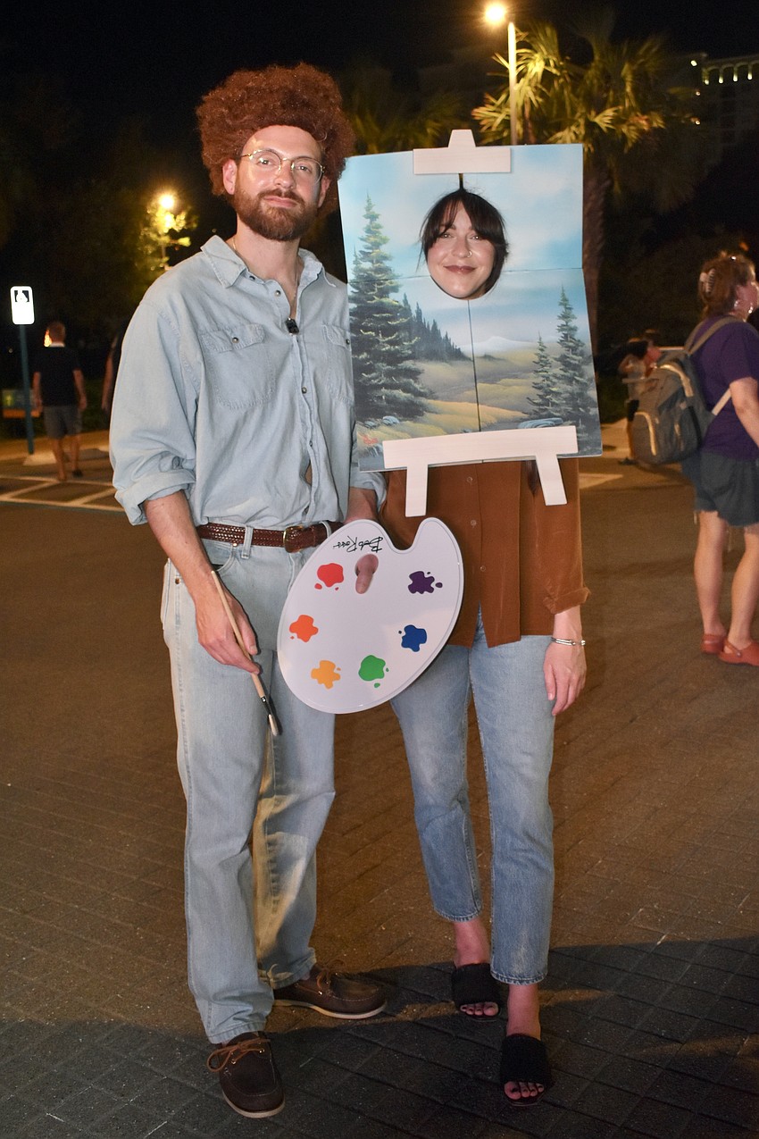 Tim and Heather Saba came as Bob Ross and a painting.
