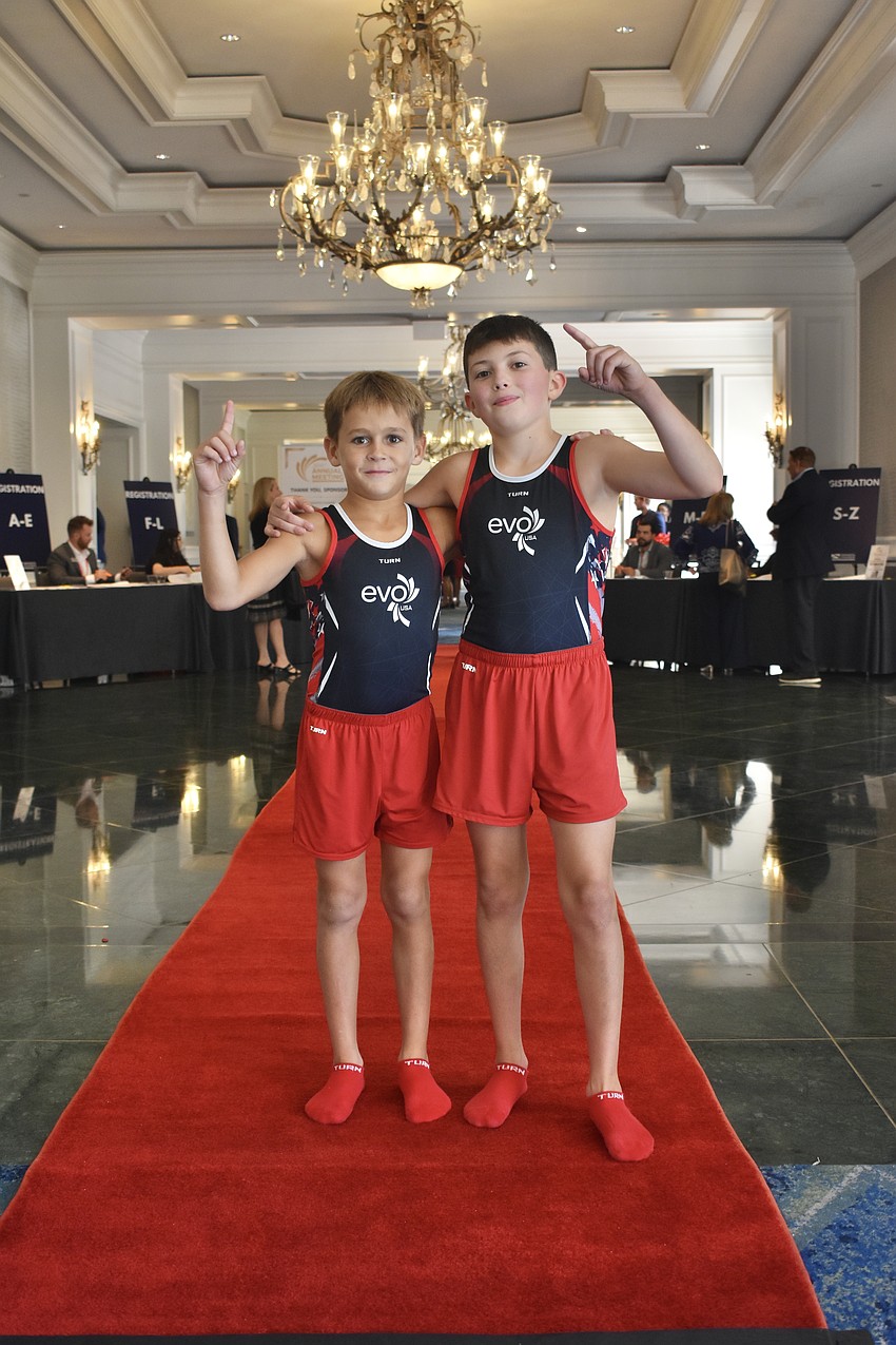 Luca Leykin, 9 and Blake Kilroy, 11 of EVO Gymnastics, awed visitors with their gymnastics skills.