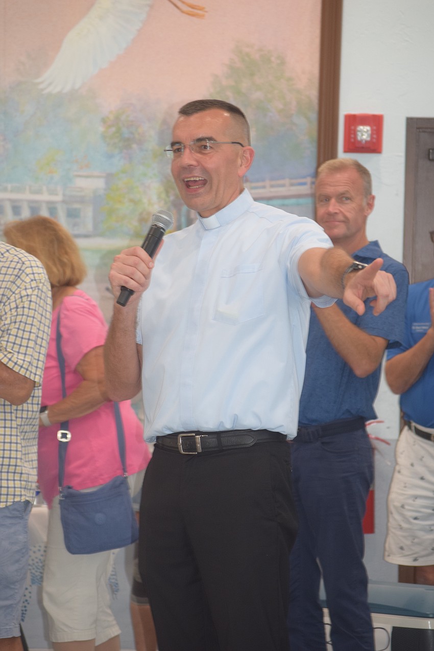 The Rev. Robert Dziedziak at the St. Mary Star of the Sea potluck.
