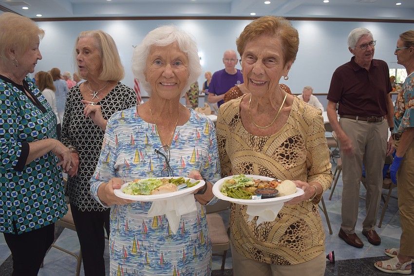 Dottie Mueller and Dottie Pirolli at the St. Mary Star of the Sea potluck.