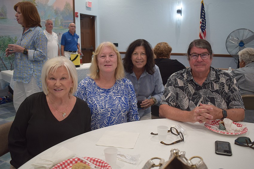 Linda Olsen, Nancy Gornto, Lyn Kennelly and John Gornto at the St. Mary Star of the Sea potluck.