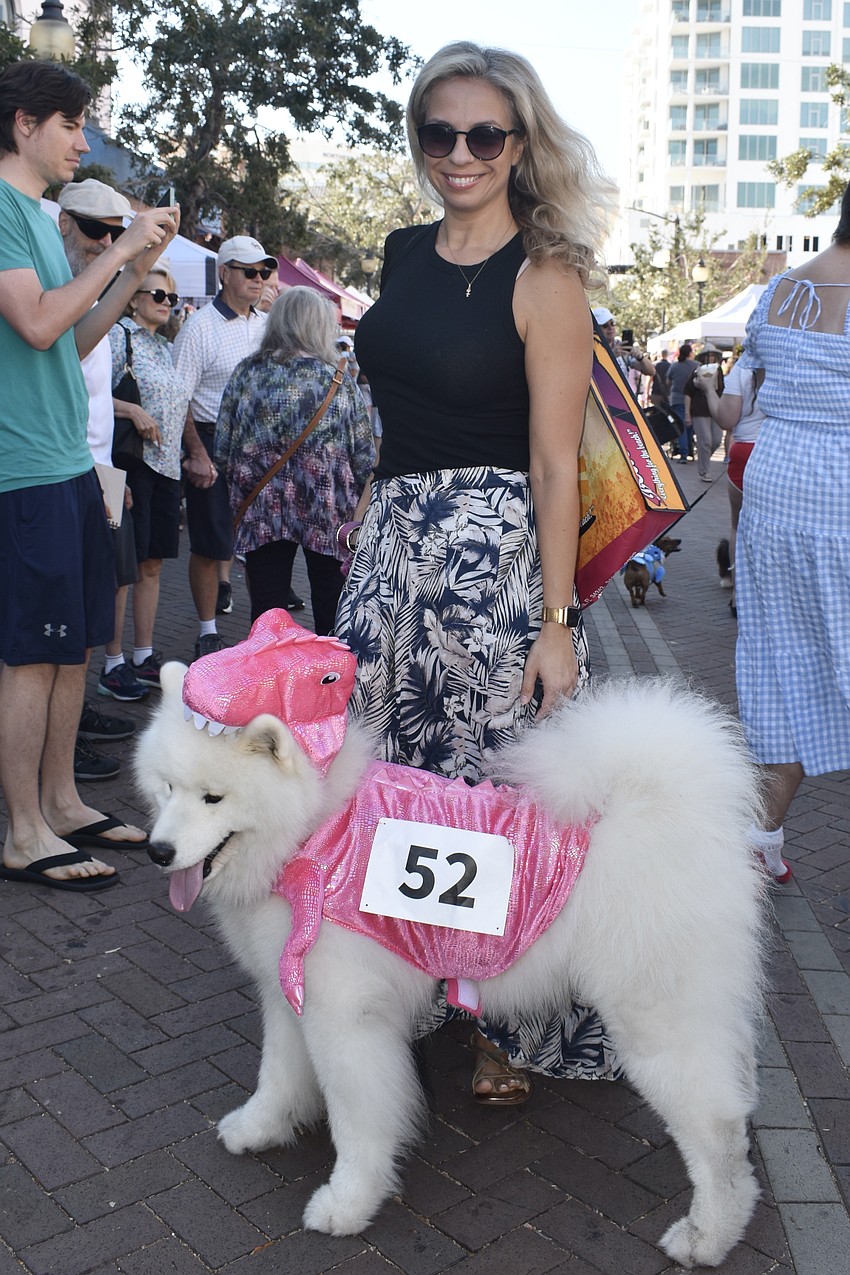 Larisa Kozij's dog Shasta came dressed as a dinosaur.