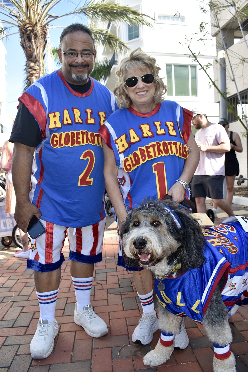 Peter and Donna Bridge and their dog Winston won first place in the contest for their Harlem Globetrotters costume.
