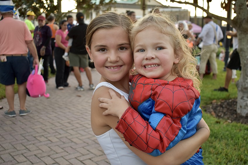 Lakewood Ranch's Lakeland Dunigan, 9, and Elle Filarski, 3, arrive to BooFest early.