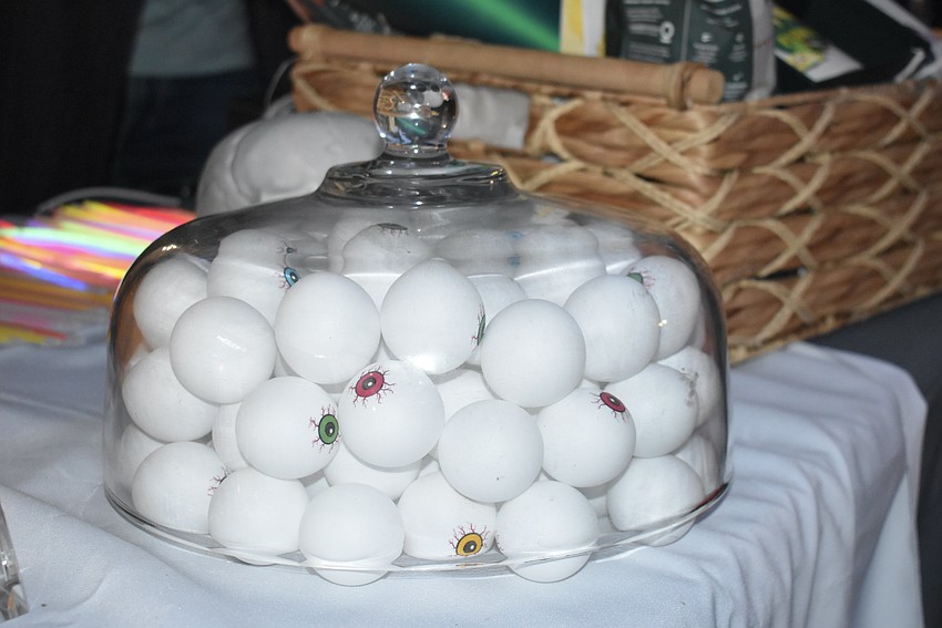 Eyeballs await the trick-or-treaters at the Milbank Team at Compass tent.