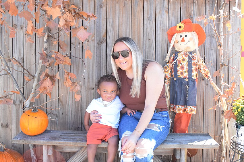 Port Charlotte 1-year-old Krew Washington and Bre Washington go to the Hunsader Farms Pumpkin Festival for the first time. 