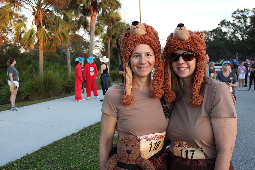 Sarasota's Phyllis Weitzner and Phoenix, Arizona's Becky Pollitt are ready to bear down in the Boo Run.