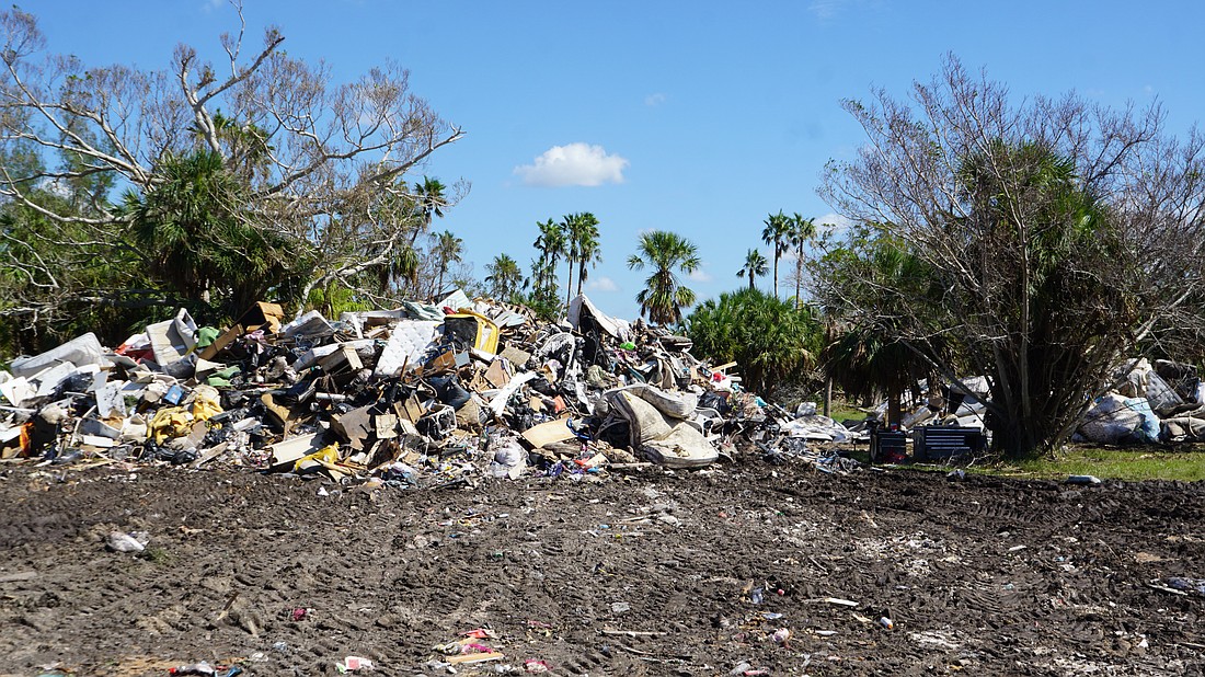 A lot near Jungle Queen Way has been used as a collection site for the town's debris contractors.