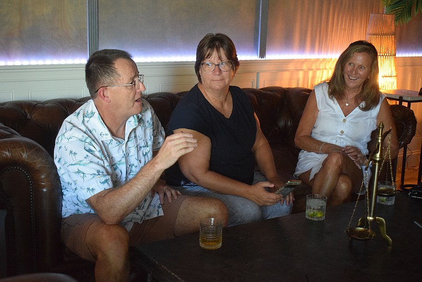 Kevin Throckmorton, Gina Throckmorton and Sherry Wesolowski at Club Leaf and Bean's community get-together