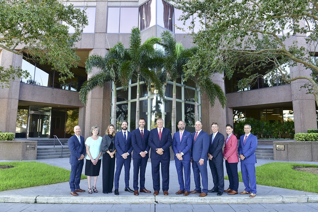 Homrich Berg leadership pictured from left to right: Ryan Best, Marjorie Sjostrom, Casey Jackman, Brad Glover, Keith Johnson, Lex Smith, Larry Parkin, Steve Cass, John Willoughby, Melissa Baron, Drew LaGrande