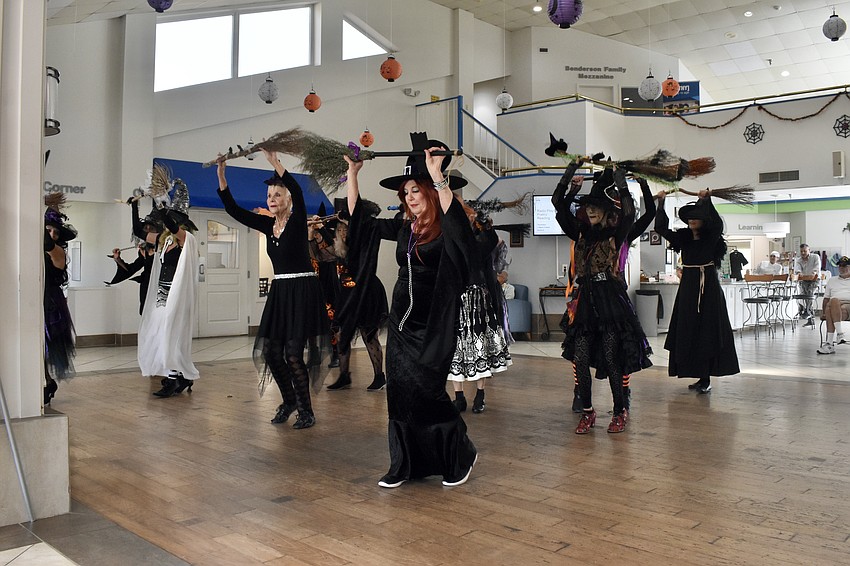 The West Coast Sand-Witches including Gail Duerst (center) offer a performance.