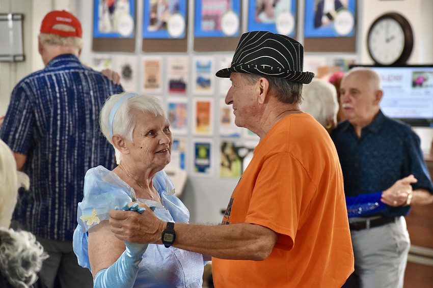 Joy Wiltzius dances with Jim Willsey.