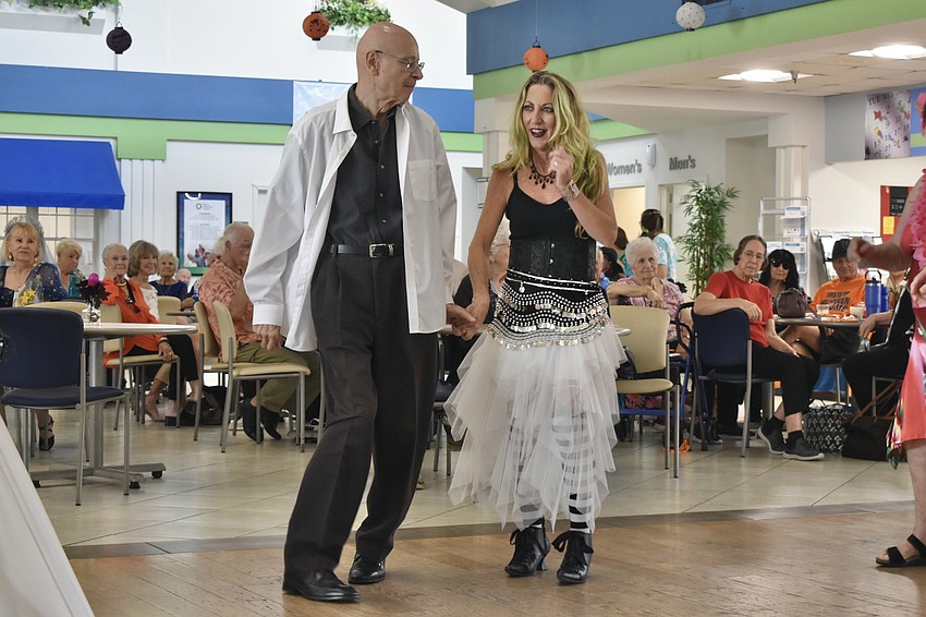 John Ross dances with Holly Larrimore of West Coast Sand-Witches.