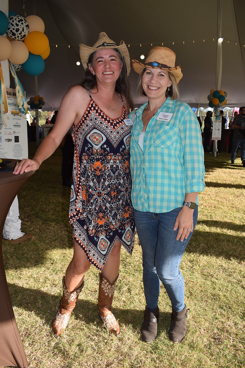 Rachel Forsyth with 1-800 Packouts and Amplify Communications Consulting's Kristen Theisen dress for the occasion.