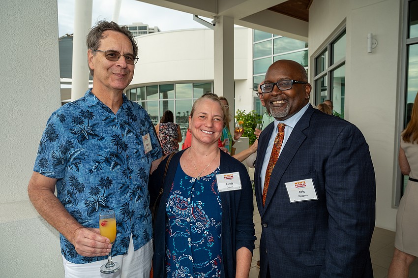 Mark and Linda Crouch with NPR's TV critic and media analyst Eric Deggans