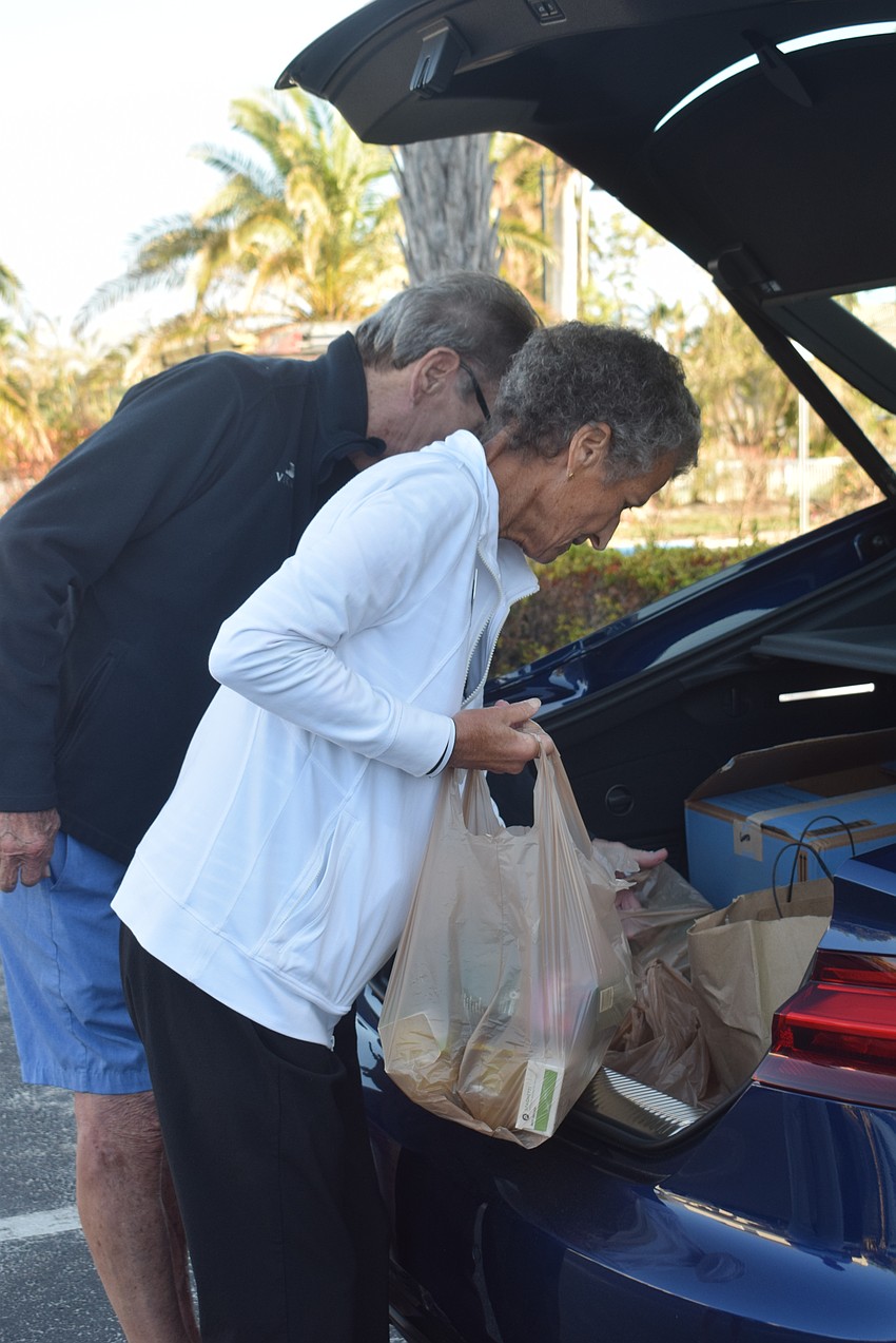 Mike McCullough and Sue Wertman at the Christ Church hurricane relief food drive.