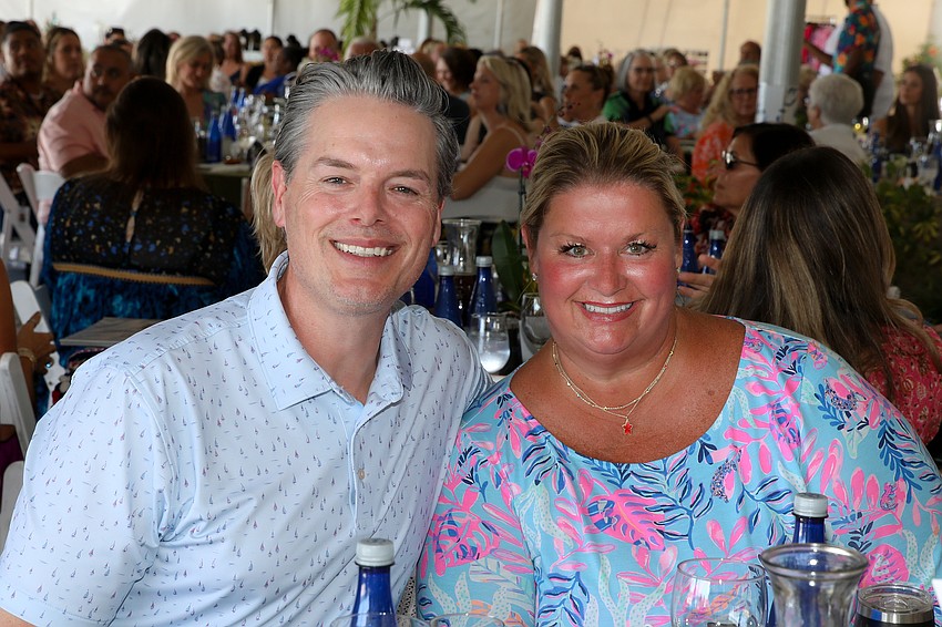 Phillip Lanham and his wife, Tami, enjoy an afternoon at Flip Flops & Fashion.