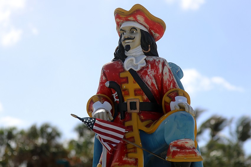 Displaced during the hurricanes Capt. Morgan is at home in his new spot at Sharky's on the Pier and was a welcoming delight for guests attending the Flip Flops & Fashion event on Oct. 30.