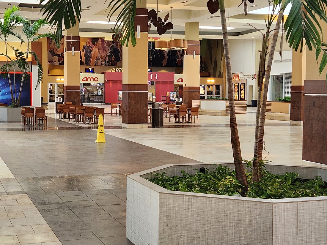 The AMC 12 movie theater was one of three businesses operating at the otherwise vacant Sarasota Square Mall.